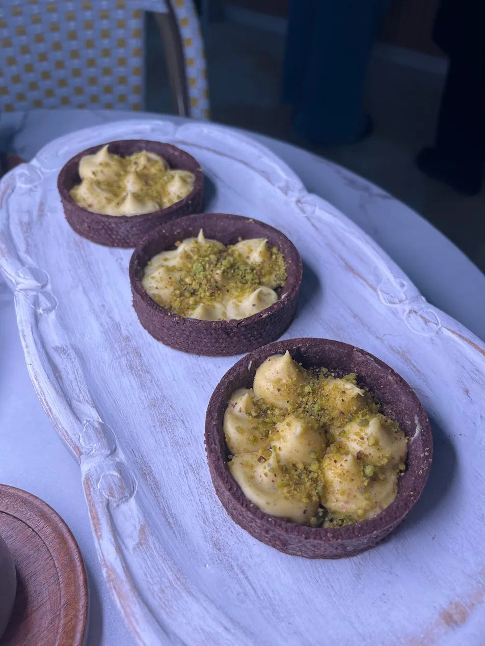 Pistachio tarts on vintage platter